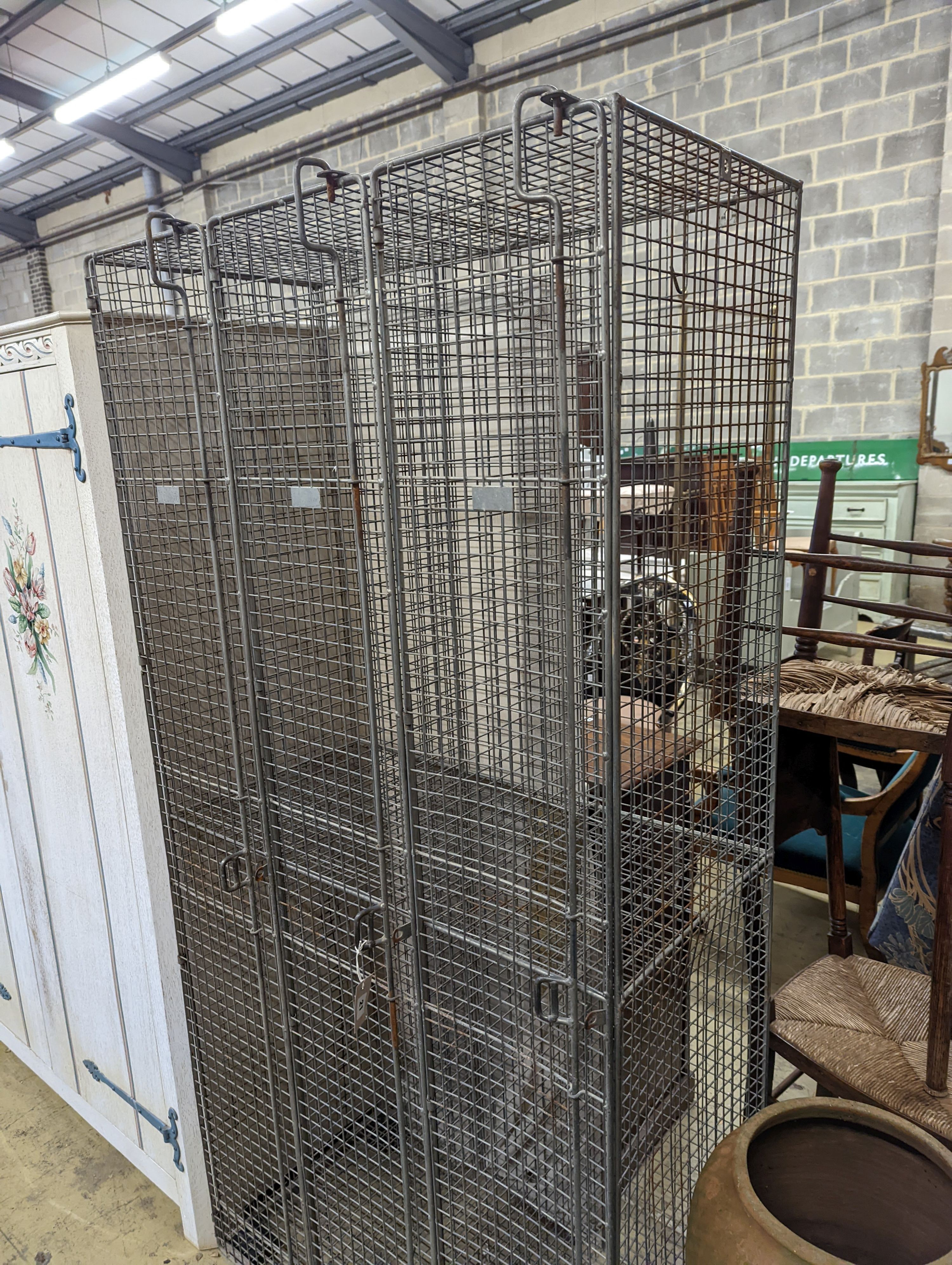 A vintage wirework 4 division locker. W-92cm, D-45cm, H-186cm.